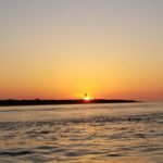 Sunrise in lighthouse Fishing Charleston 101 LLC 20180510
